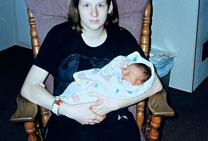 The author, age 17, holding Sarah one last time before she was taken by her adoptive parents and renamed Hanna.