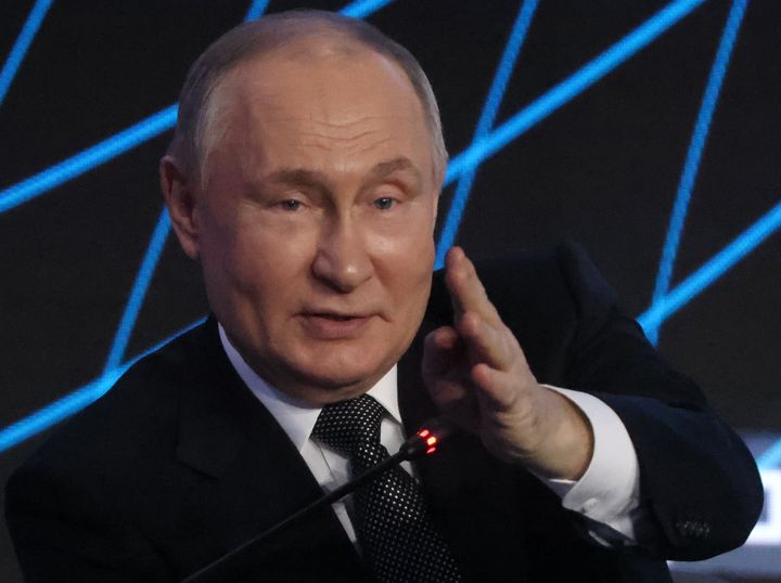 Russian President Vladimir Putin reacts during the Strong Ideas For The New Times Forum, on February 20, 2024 in Moscow.