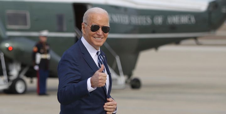 President Joe Biden gestures as he walks to board Air Force One, Friday, Feb. 16, 2024, at Andrews Air Force Base, Maryland. (AP Photo/Luis M. Alvarez)