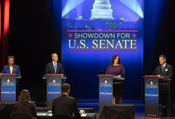 (From left) Democratic Sens. Barbara Lee, Adam Schiff, Katie Porter and former baseball player during a televised debate for candidates in the Senate race to succeed the late California Sen. Dianne Feinstein. Candidates with player Steve Garvey on stage.