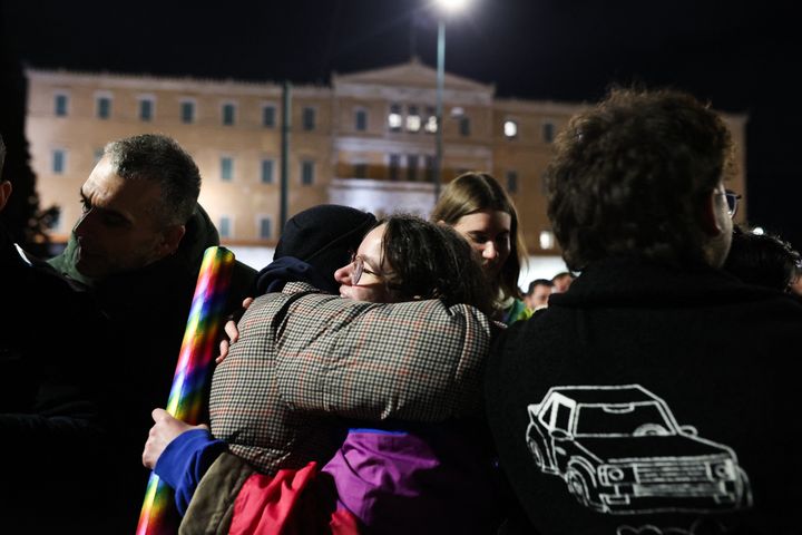 People celebrate the approval of same-sex marriage by parliament in Athens. Greece, on Feb. 15, 2024.