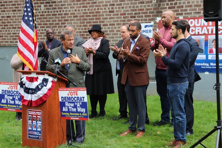 George Latimer, with microphone, campaigns in Mount Vernon, the majority-Black town where he grew up, at the start of early voting in 2021.