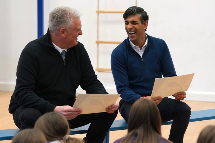 Rishi Sunak sits with the then deputy Tory chairman Lee Anderson as he visits Woodland View Primary School in Sutton-in-Ashfield, Nottinghamshire, last month. 