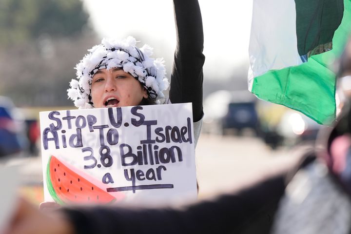 A protester demonstrates outside of the Dearborn location where a senior Biden administration official met with Arab American leaders on Feb. 8.