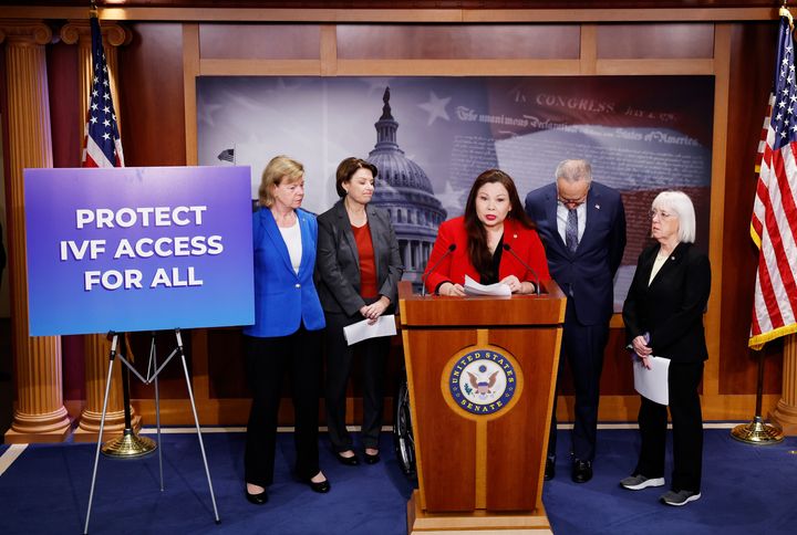 U.S. Sen. Tammy Duckworth (D-Ill., center) speaks during a news conference at the U.S. Capitol on protections for access to in vitro fertilization on Feb. 27 in Washington, D.C.