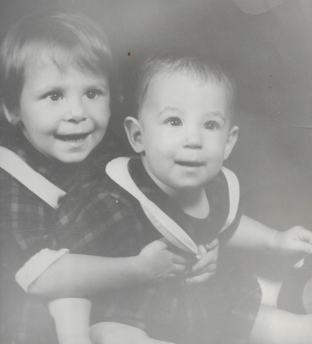 An old picture shows the author, right, and her sister. 