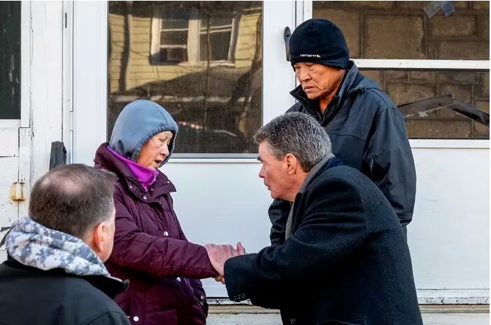 Parents of gunman Canh Le speaking with Delaware County District Attorney Jack Stollsteimer