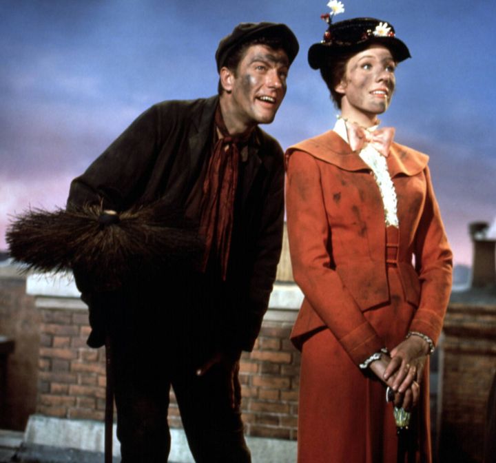 (Left to Right) Actors Julie Andrews and Dick Van Dyke star in the 1964 Disney film, "Mary Poppins." The British Board of Film Classification recently increased its rating from "U" for universal to PG for its "discriminatory language." In a world of book banning, will parents be willing to talk to kids about the movie's concerning text — or restrict it altogether?