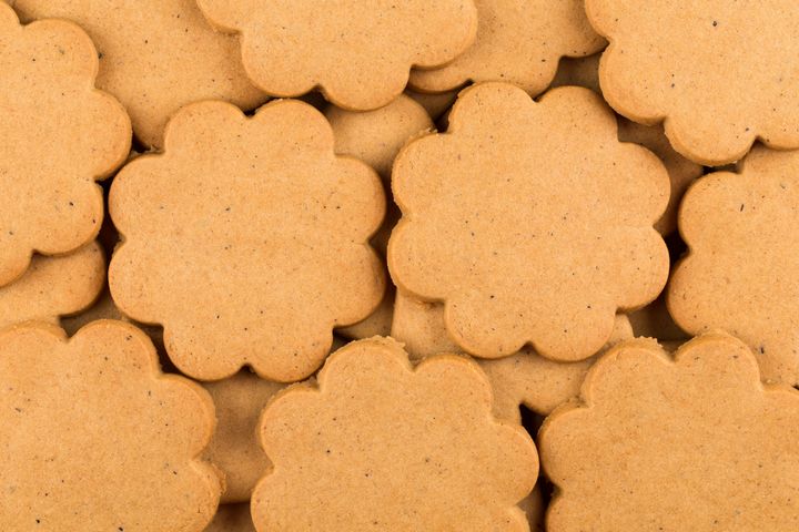 Gingerbread star cookies as a background. Christmas decoration.