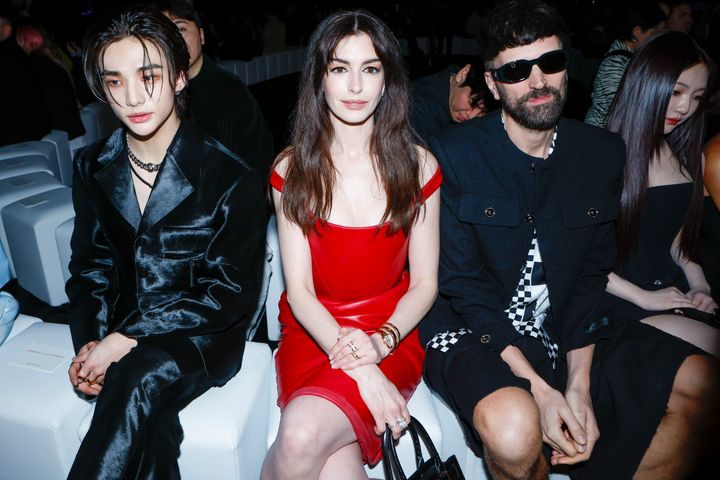 K-pop artist Hyunjin and Anne Hathaway at the Versace fashion show in Milan, Italy on Feb. 23. 