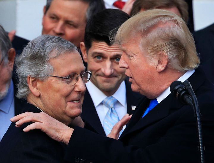 Trump and McConnell embrace during one of the relationship’s peaks: the passage of a large tax cut in 2017. Their relationship’s valleys would be much, much lower.
