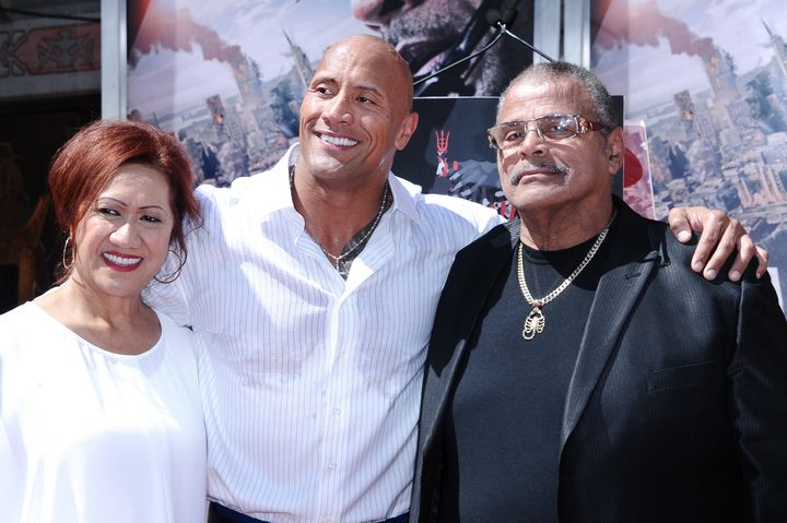 Dwayne Johnson photographed with his parents Ata Johnson and Rocky Johnson at the TCL Chinese Theatre on Tuesday, May 19, 2015, in Los Angeles, California. 