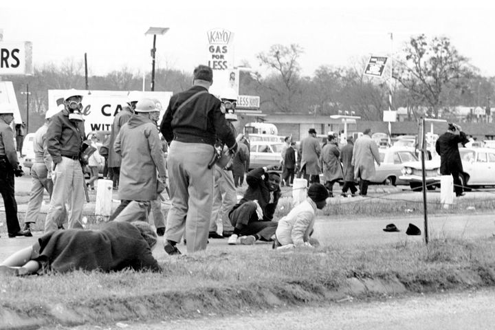 In this March 7, 1965 photo, civil rights demonstrators struggle on the ground as state troopers break up a march in Selma, Alabama. The world knows the names of John Lewis and other voting rights demonstrators who walked across Selma's Edmund Pettus Bridge in 1965, only to be attacked by Alabama state troopers on a day that came to be called “Bloody Sunday."