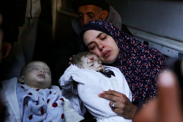 Rania Abu Anza cradles her twins, who were killed in an Israel strike on a house in Rafah, in the southern Gaza Strip, Sunday, March 3, 2024. Abu Anza and her husband, who was killed in the same strike, spent 10 years trying to get pregnant.