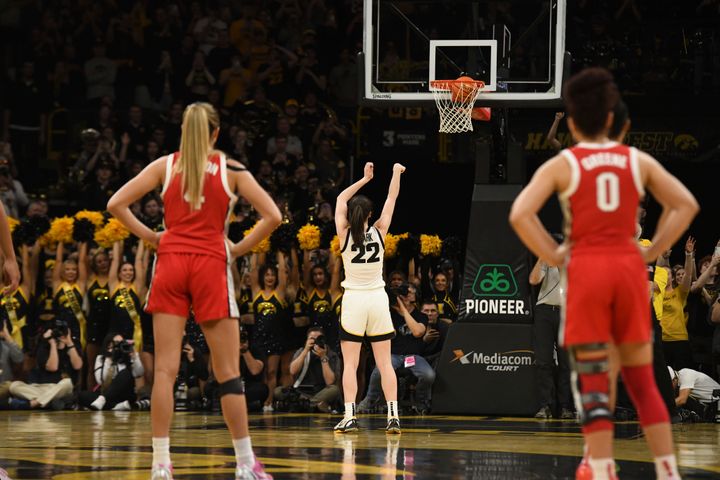 Iowa guard Caitlin Clark (22) sinks a technical foul to become the all-time leading scorer in NCAA Division I basketball during the first half of a college game against Ohio State, Sunday, March 3, 2024, in Iowa City, Iowa. (AP Photo/Cliff Jette)