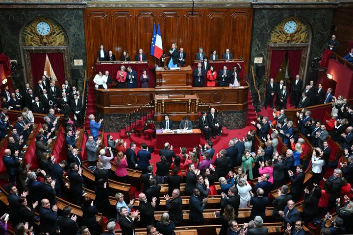 Nearly the entire joint session stood to applaud after President of the National Assembly Yael Braun-Pivet announced the result of the vote Monday in Versailles, southwestern of Paris.