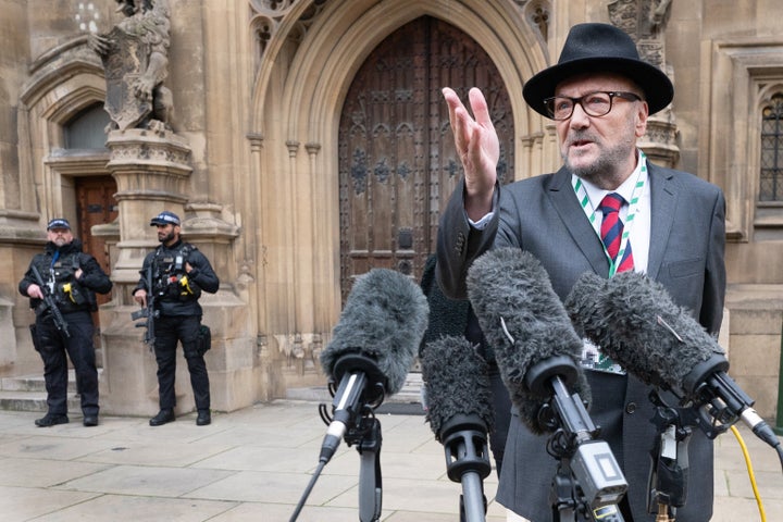 ID PASS HAS BEEN PIXELATED BY PA PICTURE DESK Newly elected MP for Rochdale, George Galloway, with his wife Putri Gayatri Pertiwi, speaks to the media outside the Houses of Parliament in Westminster, London after he was sworn in following his victory in the Rochdale by-election last week. Picture date: Monday March 4, 2024. (Photo by Stefan Rousseau/PA Images via Getty Images)