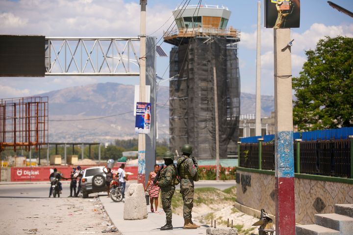 Soldiers guard the entrance of the international airport in Port-au-Prince, Haiti, on March 4, 2024. Authorities ordered a 72-hour state of emergency starting Sunday night following violence in which armed gang members overran the two biggest prisons and freed thousands of inmates over the weekend.