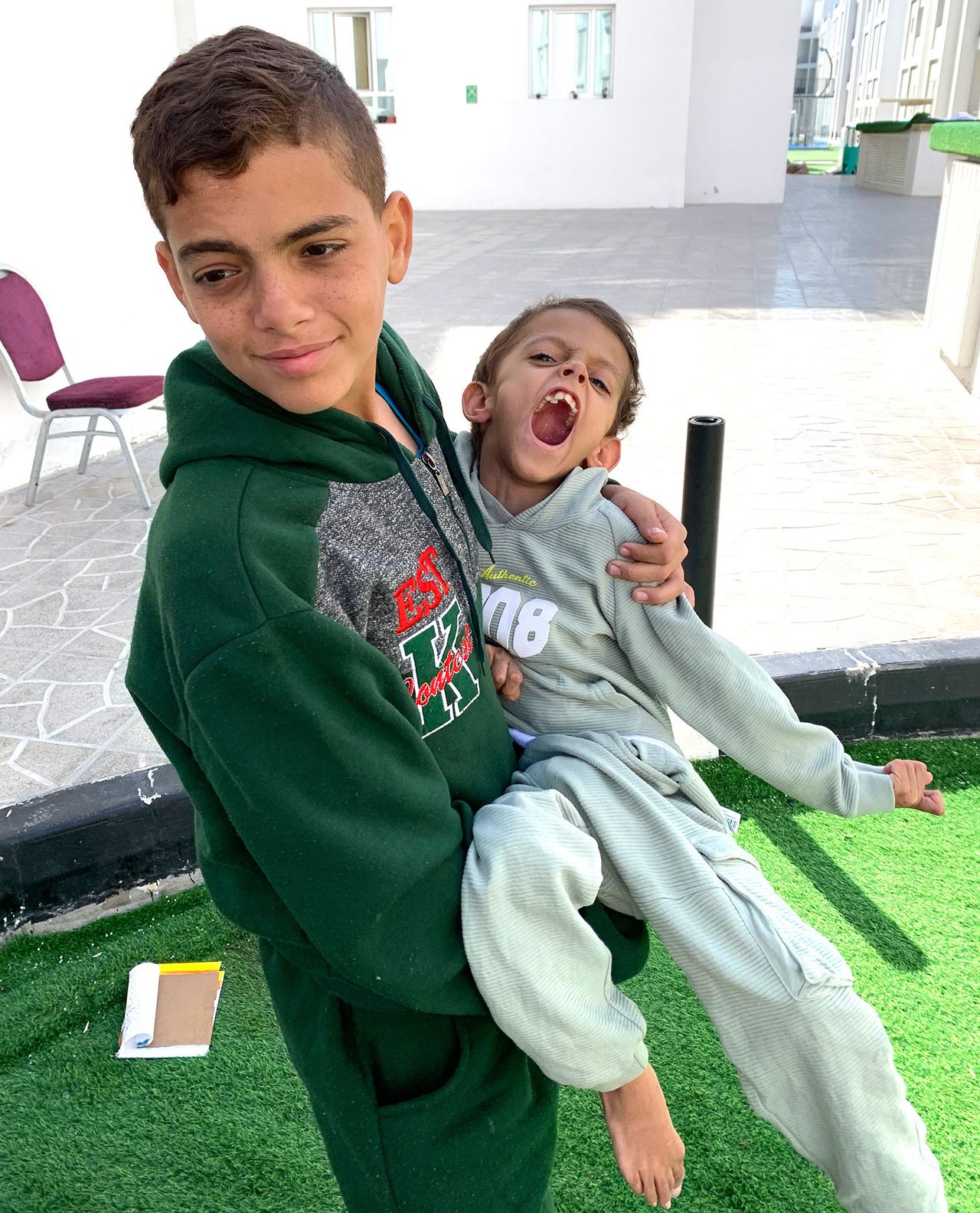 Anas (left) and his brother Adham were hit by Israeli bombing while seeking firewood for their family.