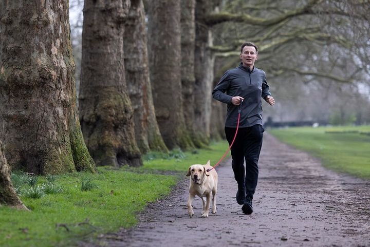 Chancellor dog exercises with his dog Poppy ahead of the Budget.