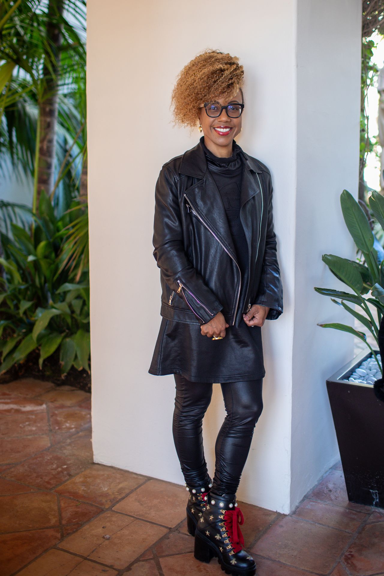 This is Latraviette Smith-Wilson's fourth year at the conference. She's wearing Gucci boots and a leather jacket by Mess in a Bottle. ”I’m a mood dresser," she said. "Literally how I feel when I wake up is how I will show up that day. Generally, I love the unexpected.”