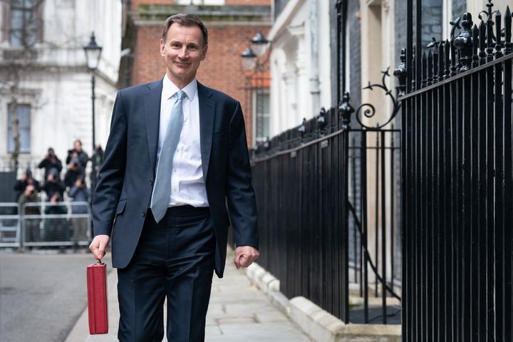 LONDON, ENGLAND - MARCH 06: Chancellor of the Exchequer, Jeremy Hunt, leaves 11 Downing Street with his ministerial box before delivering his Budget in the Houses of Parliament on March 06, 2024 in London, England. Chancellor Jeremy Hunt delivers his 2024 Spring Budget to Parliament. (Photo by Stefan Rousseau - WPA Pool/Getty Images)
