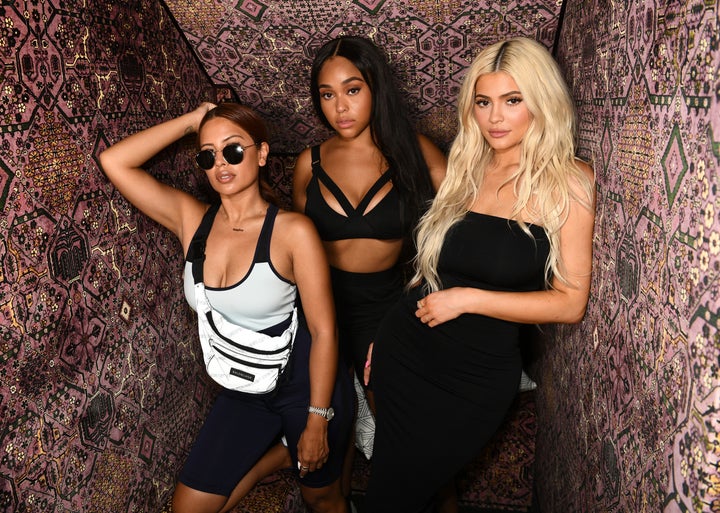 Palmer (left), model Jordyn Woods and Jenner (right) in 2018.