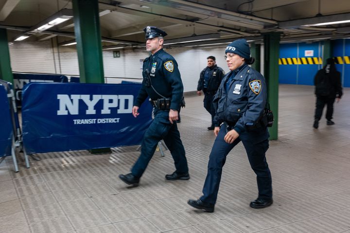 NYPD officers patrol a subway station on Wednesday.