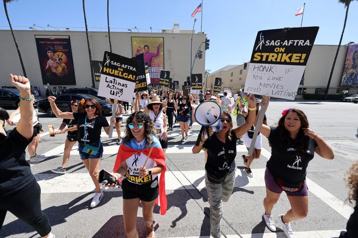 Latinas Acting Up members join the picket line outside Warner Bros. Studios on Aug. 25, 2023, in Burbank, California. Members of SAG-AFTRA and the Writers Guild of America had walked out in their first joint strike against the studios since 1960. The strike last fall.