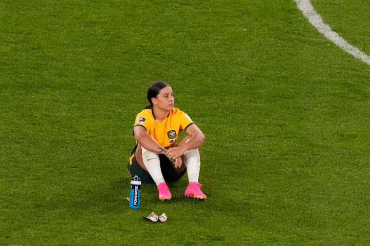 Australia's Sam Kerr sits on the ground after the Women's World Cup semifinal soccer match between Australia and England at Stadium Australia in Sydney, Australia, on Aug. 16, 2023.