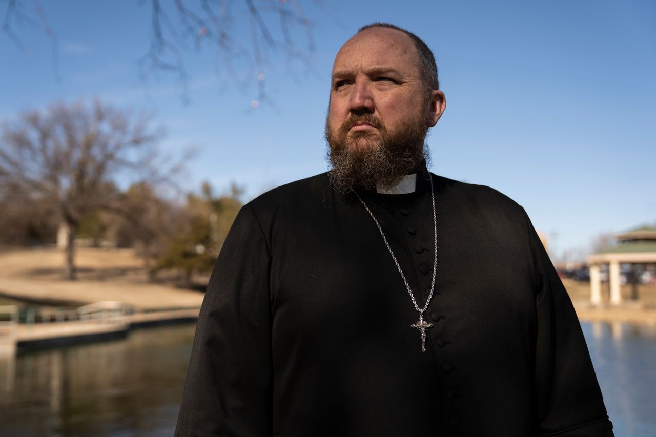 Father James Neal poses for a portrait in Enid, Oklahoma February 20, 2024. Nick Oxford for HuffPost