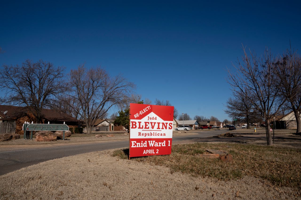 A campaign sign for Judson Blevins is displayed at the entrance to a neighborhood in Enid, Oklahoma February 20, 2024. 
