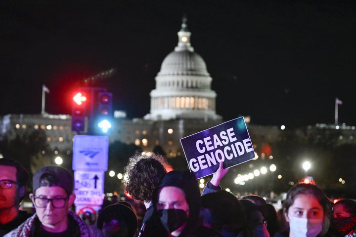 Hundreds of demonstrators demanding an immediate cease-fire in the Gaza Strip unfurled a large Palestinian flag and staged a sit-in on a major roadway President Joe Biden would normally use to reach the Capitol building, just minutes before he is set to address a joint session of Congress on March 7, 2024.