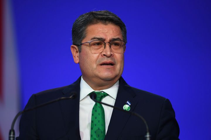 Honduras' President Juan Orlando Hernandez speaks during the opening ceremony of the UN Climate Change Conference COP26 in Glasgow, Scotland, Monday Nov. 1, 2021.(Andy Buchanan/Pool via AP)