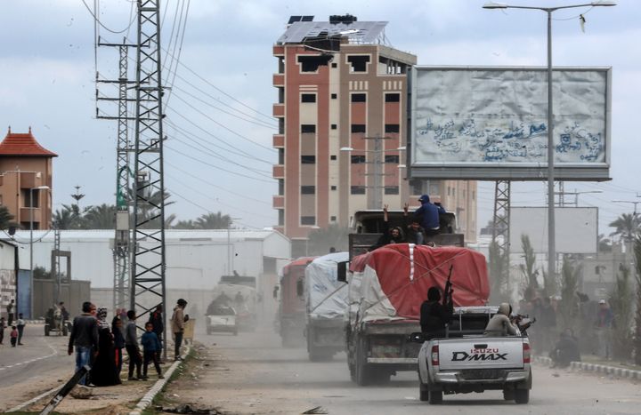 Trucks are carrying humanitarian aid into Rafah in the southern Gaza Strip after crossing the terminal border from Egypt, on March 8, 2024. (Photo by Majdi Fathi/NurPhoto via Getty Images)