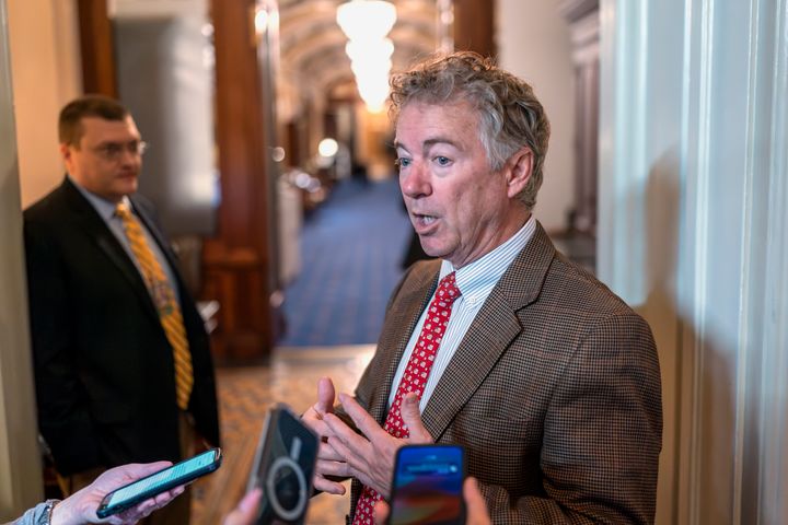 Sen. Rand Paul, R-Ky., pauses to speak to reporters outside the chamber at the Capitol in Washington, Sunday, Feb. 11, 2024. (AP Photo/J. Scott Applewhite)