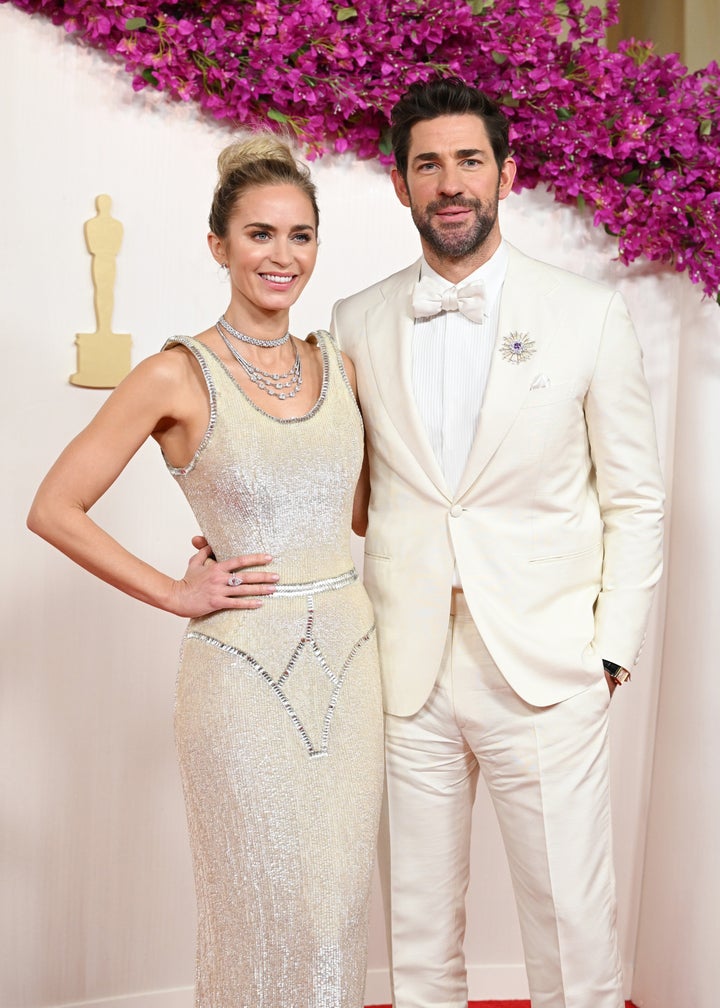 Blunt, left, with husband John Krasinski. 