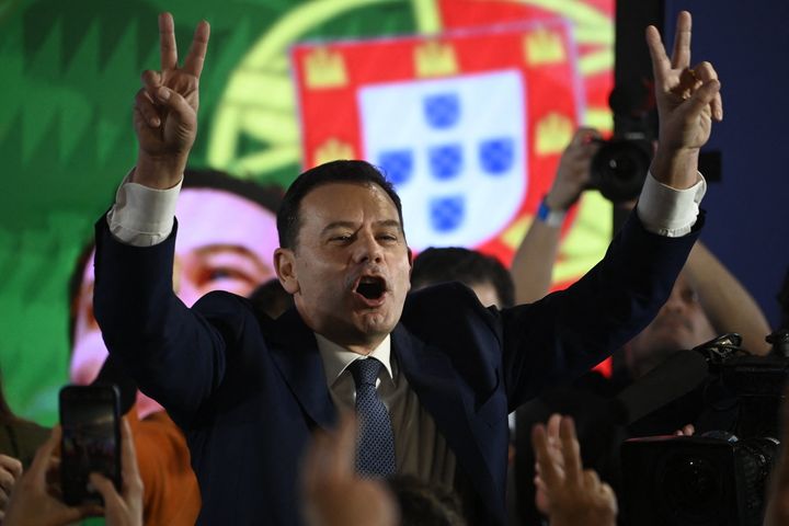 TOPSHOT - Democratic Alliance (AD) leader Luis Montenegro celebrates his victory as he addresses supporters at the party's election night headquarters, in Lisbon on March 10, 2024. Portugal's main centre-right party narrowly defeated the incumbent Socialists but fell well short of a majority in a general election today in which far-right Chega surged to become a potential kingmaker.