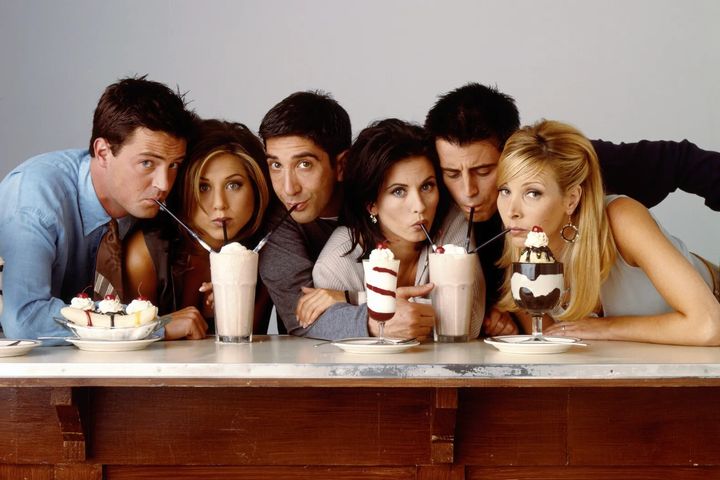 Cast of Friends drinking milkshakes.