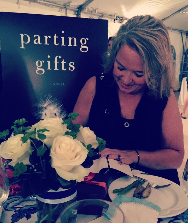 The author at a book signing event for her novel, "Parting Gifts," in 2016