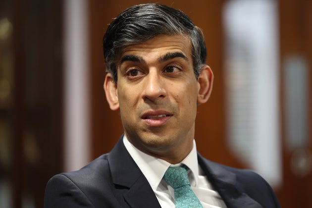 LONDON, ENGLAND - MARCH 11: Prime Minister Rishi Sunak (R) talks with Ahmad Al Dubayan, Director General of the London Central Mosque (not in frame) during a visit to the Mosque on March 11, 2024 in London, England. (Photo by Daniel Leal - WPA Pool / Getty Images)