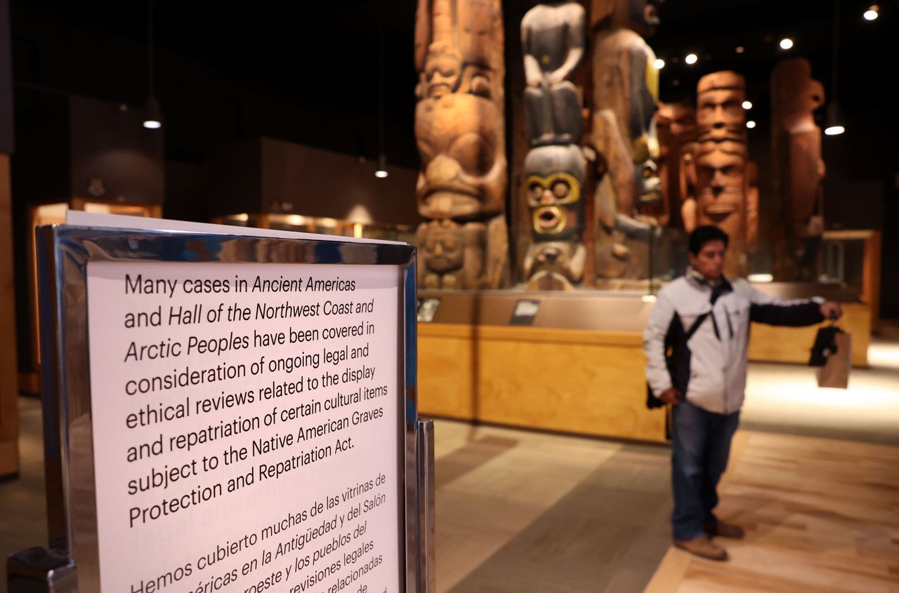 Messages greet the public upon arrival in the Halls of the Ancient Americas and the Hall of Northwest Coast and Arctic Peoples at the Field Museum in Chicago on Jan. 18, 2024. The decision to cover various items in display cases was made in response to new revisions to the Department of Interior's regulations regarding Native American human remains, funerary objects and sacred artifacts. The revisions partly insist that institutions consult with tribes before exhibiting or even studying such objects.