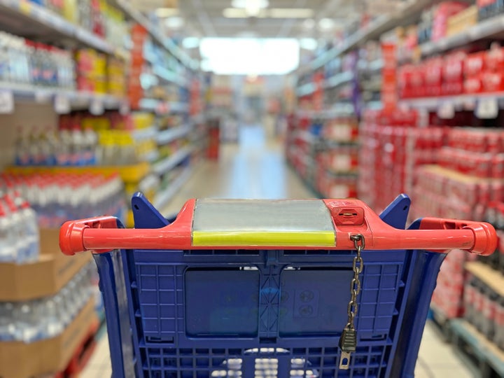 An Empty Trolley at Supermarket corridor