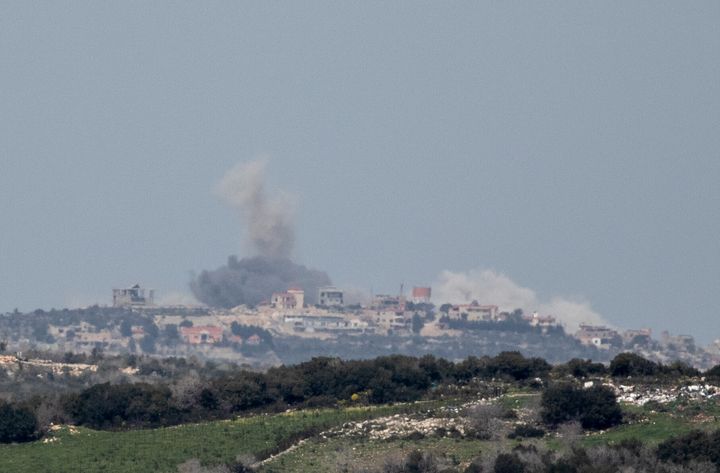 Smoke rises over a village in Lebanon from Israeli strikes as seen from the northern Israeli side of the border on March 13, 2024. Israel and Hezbollah, the Iran-backed militant and political group in Lebanon, have traded near daily strikes in recent months, as the war in Gaza stokes regional hostilities.