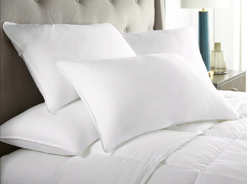 Set of four Dowlite medium-dense pillows.