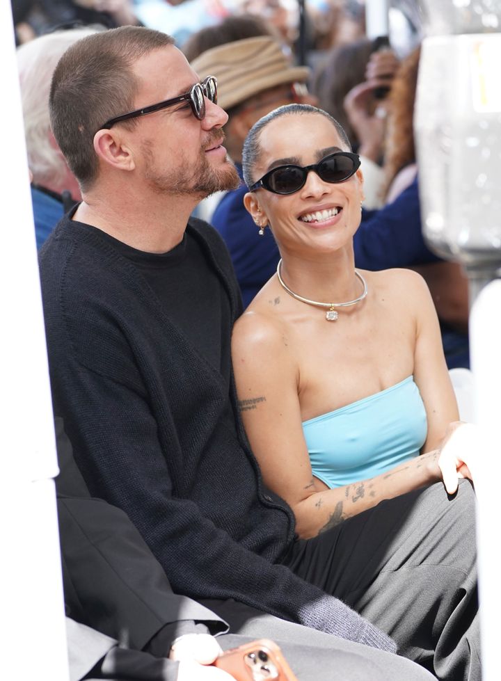 Channing Tatum and Zoë Kravitz seen sitting together at the "Batman" star's father's Hollywood Walk of Fame ceremony on Tuesday in Los Angeles.