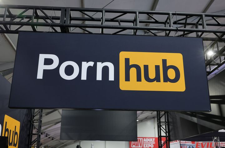  A sign hangs at the Pornhub booth at the 2024 AVN Adult Entertainment Expo at Resorts World Las Vegas on January 24, 2024 in Las Vegas, Nevada. 