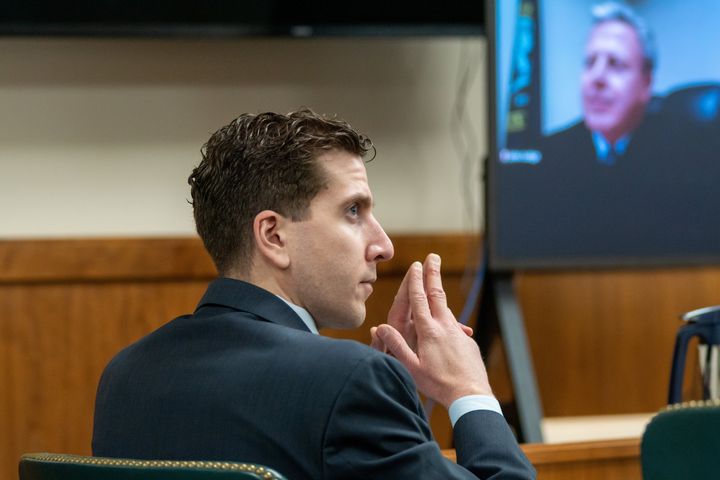 Bryan Kohberger listens to arguments during a hearing to overturn his grand jury indictment on Oct. 26, 2023, in Moscow, Idaho. Kohberger, a former criminology PhD student, was indicted in May 2023 in the November 2022 killings of four students in an off-campus apartment near the University of Idaho.