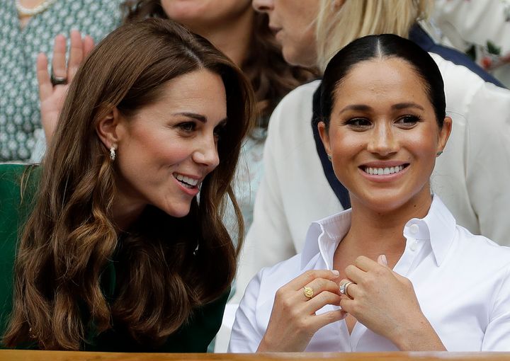 Kate Middleton and Meghan Markle photographed together at the Wimbledon Tennis Championships in London, July 13, 2019. 