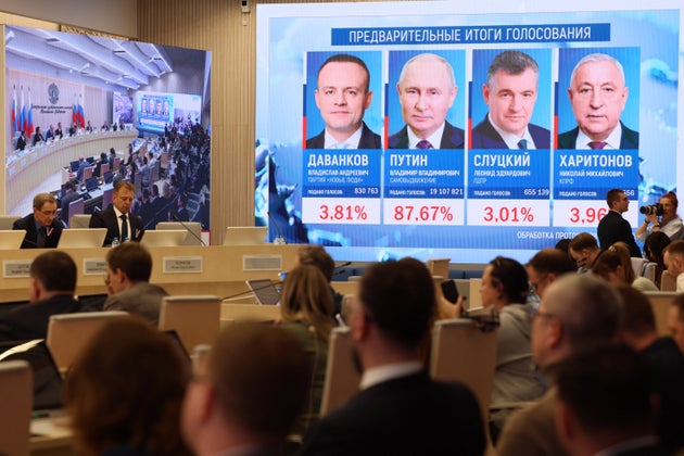 Preliminary voting results in the Russian presidential election are displayed on a screen at the Central Election Commission in Moscow on March 17, 2024. Vladimir Putin secured 88 percent of the first votes counted in Russia's presidential election, the head of Russia's election commission said on March 17, 2024. (Photo by STRINGER / AFP) (Photo by STRINGER/AFP via Getty Images)